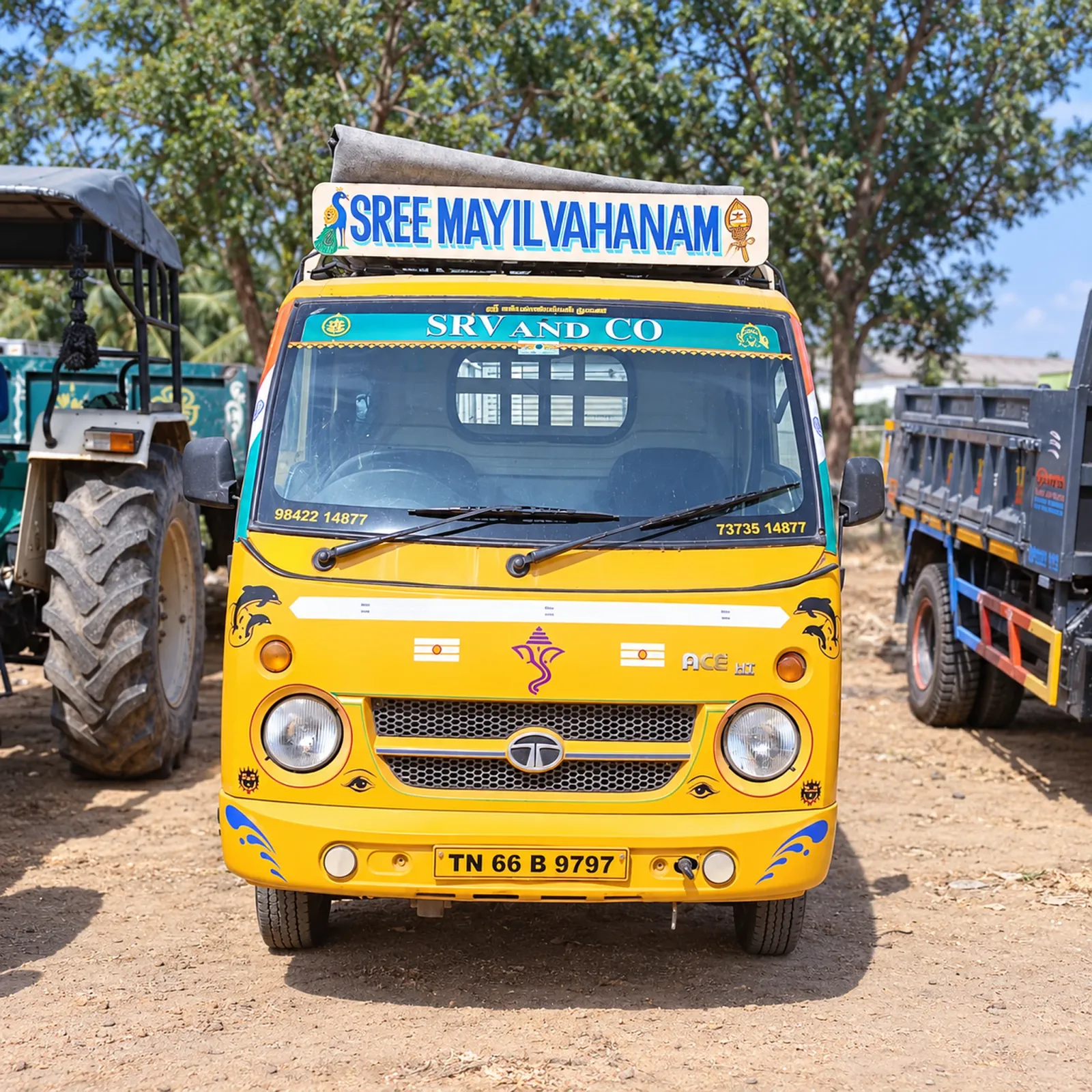 SRV AND CO yellow mini truck in the yard