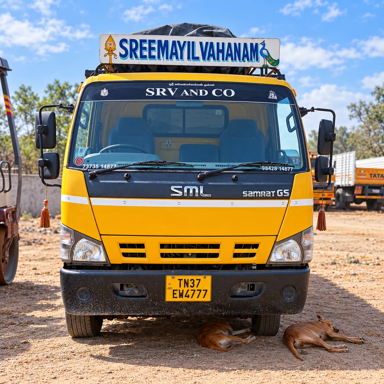 SRV AND CO yellow SML tipper truck in the yard