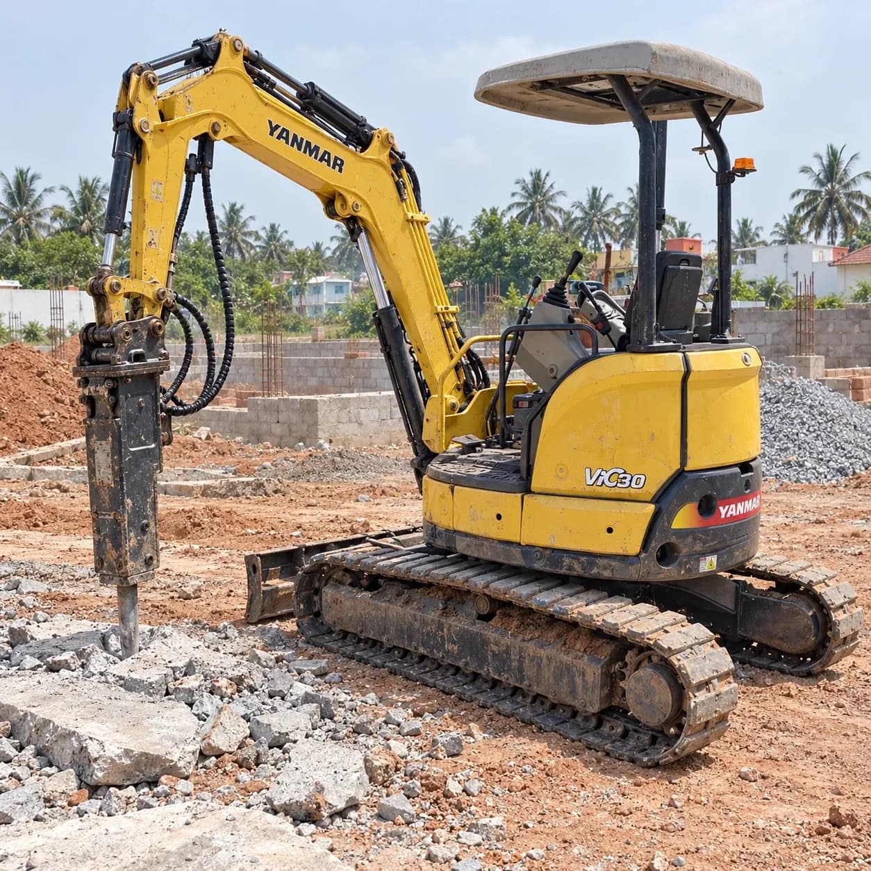 Representative image of a Yanmar mini excavator with a DOZCO hydraulic rock breaker